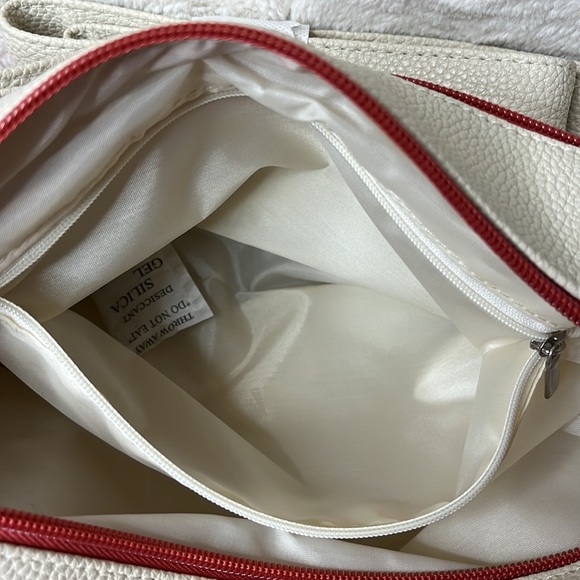 Stone & Co. two-toned crossbody. Double zipper top closure. Adjustable strap - Picture 13 of 15